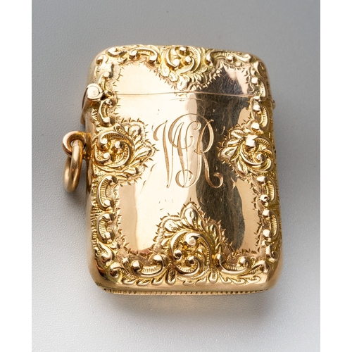 726 - A late Victorian 9ct gold vesta case, the borders chased with waisted band of flowers, central initi... 