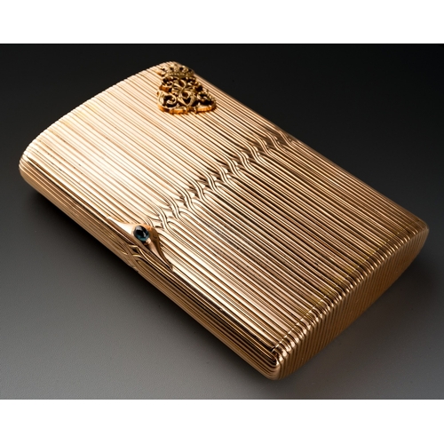 A Russian Imperial 56 zolotniks (14ct) gold snuff box, St Petersburg, circa 1910, the entire with interlaced reeded pattern, sapphire cabochon thumbpiece, the cover applied with Ducal Coronet over intertwined initials, stamped BA, Standard Mark, gross weight approx 159.3 grams, approx 10.5 x 7cm