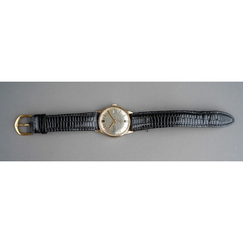 740 - A 9 ct gold vintage Accurist gent's wristwatch, round silver dial signed 'Accurist, 21 jewels', Roma... 