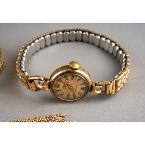 754 - A selection of five wristwatch. To include, a 9ct gold Tissot quartz wristwatch, hallmarked 9ct gold... 