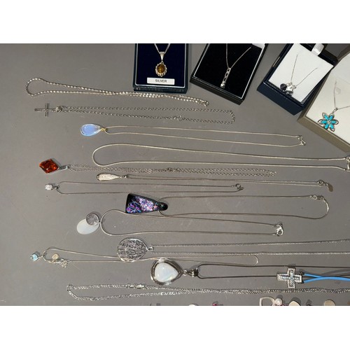 761 - A collection of white metal (marked 925) and sterling silver chains and pendant to include one set w... 