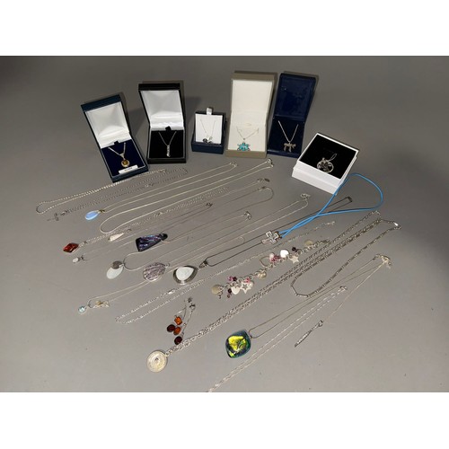 761 - A collection of white metal (marked 925) and sterling silver chains and pendant to include one set w... 