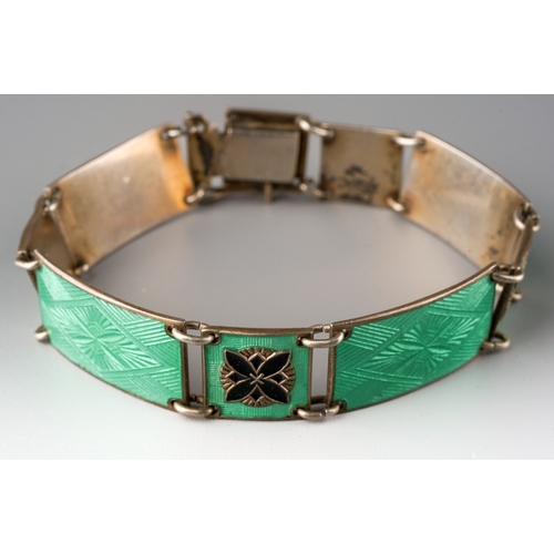 765 - A Norwegian enamel bracelet, by Norne, of rectangular green guilloche enamel links spaced by green a... 