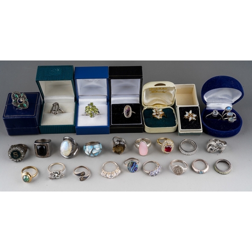 767 - Collection of silver, white metal and dress rings. Some set with various semi precious stones (q)