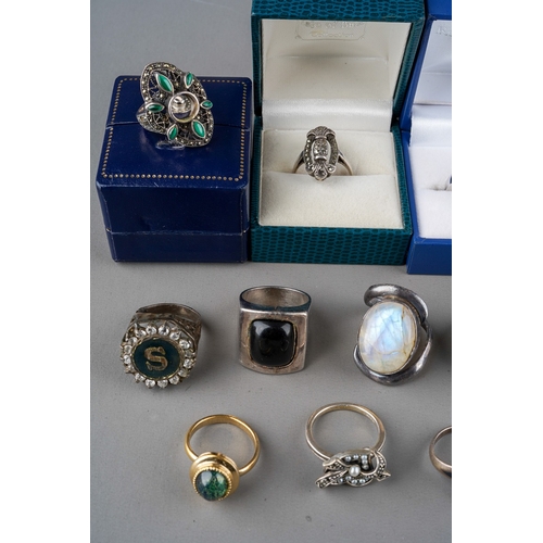 767 - Collection of silver, white metal and dress rings. Some set with various semi precious stones (q)