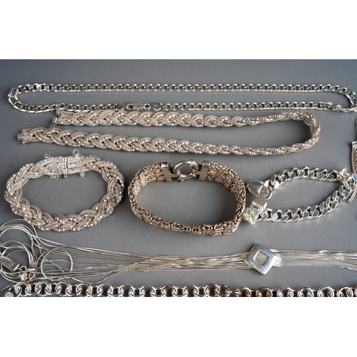 771 - Collection of silver jewellery to include chunky chains, bracelets ,a set complete with earrings etc... 