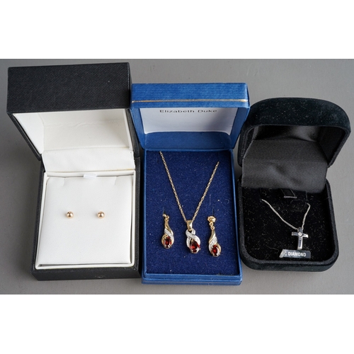 774 - 9 ct gem set pendant and earrings by Elizabeth Duke, 9 ct white gold chain and cross set with a diam... 