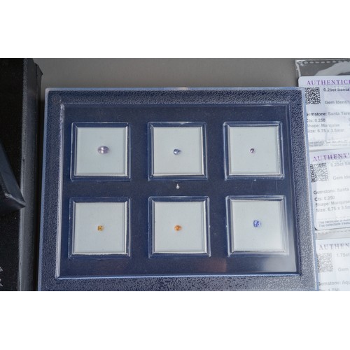 792 - Large collection of Gem Collectors gem stones with certificates, to include a display set, 4 fancy d... 