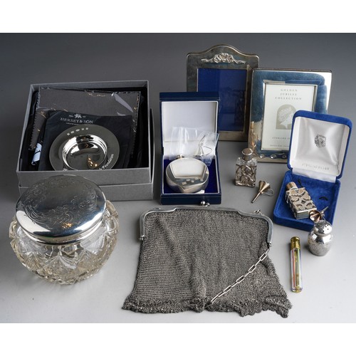 793 - A collection of silver including photograph frames, Florence Nightingale dish, plain scent bottle (b... 