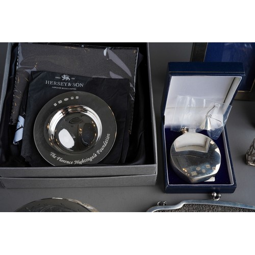 793 - A collection of silver including photograph frames, Florence Nightingale dish, plain scent bottle (b... 