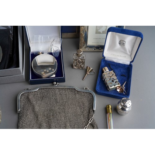 793 - A collection of silver including photograph frames, Florence Nightingale dish, plain scent bottle (b... 