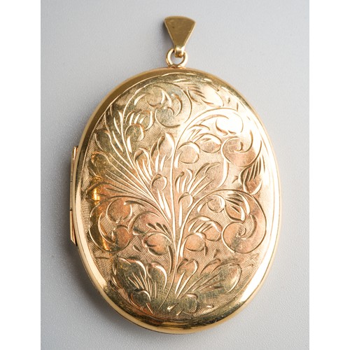 802 - Large 9k gold pendant locket with etched decoration. Gross weight 23.6g