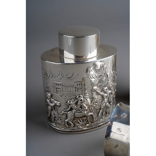 806 - An Edwardian silver tea cannister and cover, the body embossed with Classical figures and various Te... 