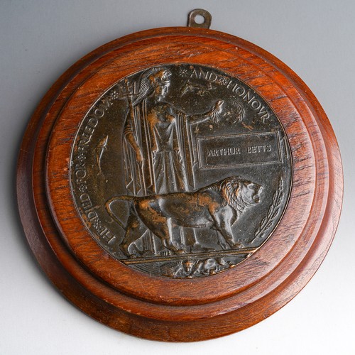 823 - A WWI Memorial death penny for Arthur Betts, mounted, together with WWI George V 1914-1918 medal awa... 