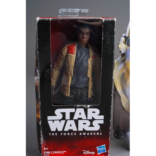 828 - Disney: three boxed Star Wars figures: Obi-Wan Kenobi, Agent Kallus and Finn (Jakku) [3]