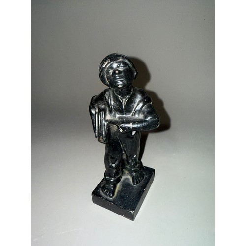 837 - A  CAST IRON QUALCAST ADVERTISING FIGURE OF A NEWS BOY, titled 'Speshul', impressed Qualcast logo ve... 