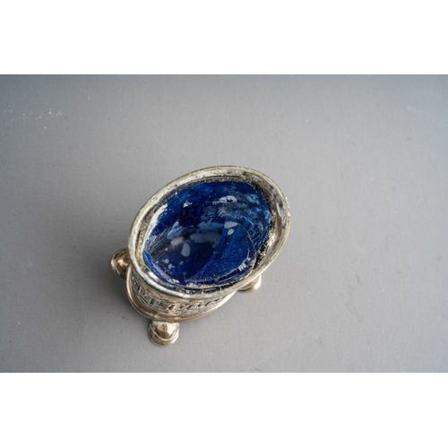 856 - A box of silver and silver plate, including a George V oval pepperette with damaged blue glass liner... 