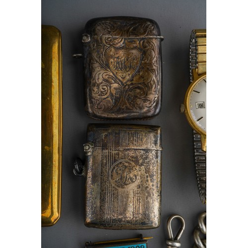 862 - A Collector`s lot to include: two early 20th Century engraved vesta cases; a late 19th Century Walth... 