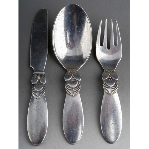 864 - A matched Georg Jensen three piece silver Christening set comprising Cactus pattern spoon, fork and ... 