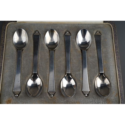 865 - Georg Jensen: a set of six early 20th Century silver Pyramid pattern coffee spoons, hallmarke by Geo... 