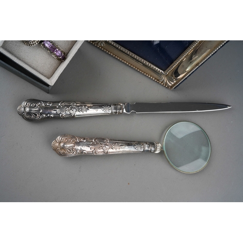 877 - Two 925 silver mounted and glass stone cocktail rings together with a Kings pattern letter opener an... 