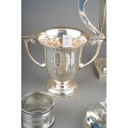 879 - A collection of early and mid 20th Century mainly presentation silver to include: silver gilt Southp... 