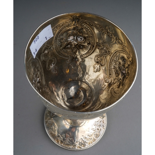 880 - A Victorian silver goblet, chased with floral oval panels, hallmarked by TB, London, 1874, approx we... 