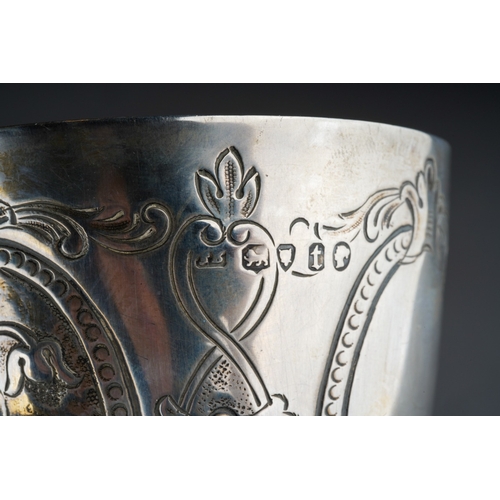 880 - A Victorian silver goblet, chased with floral oval panels, hallmarked by TB, London, 1874, approx we... 