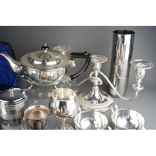 894 - Large collection of silver plated items to include trays, tea pot, candle stick, cutlery etc.