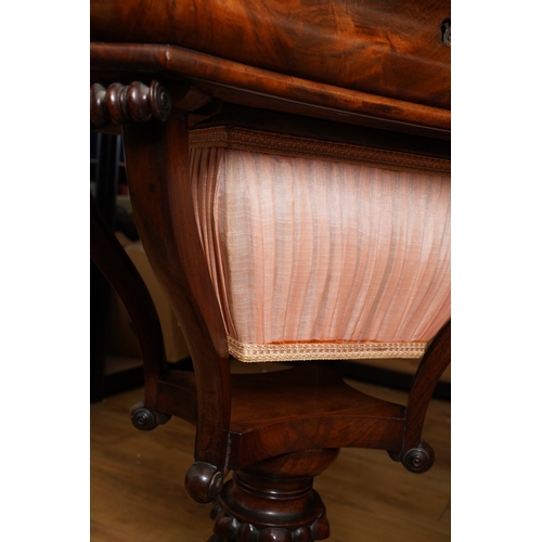 899 - A Victorian mahogany Sewing Table, the quarter veneered top opens to reveal a fitted interior with m... 