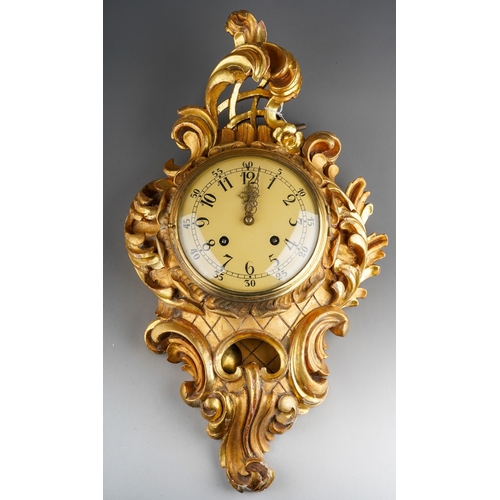 905 - Swedish gilt wood wall clock, signed Westerstrand Toreboda, dial approx 16 cm in diameter. Overall l... 