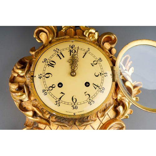 905 - Swedish gilt wood wall clock, signed Westerstrand Toreboda, dial approx 16 cm in diameter. Overall l... 