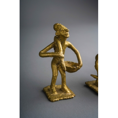 958 - Four 20th century Akan /Ashanti weight figures in a variety of poses, height of tallest 5.5cm (4)