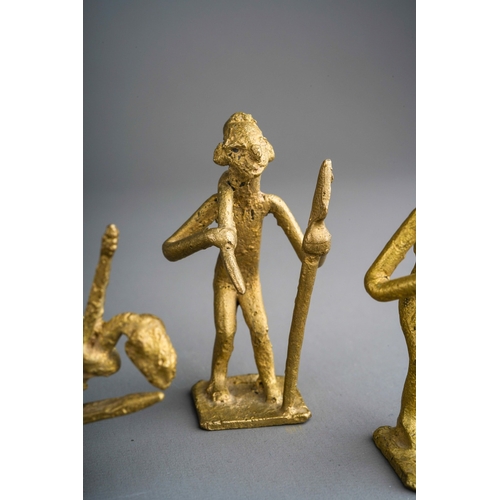 958 - Four 20th century Akan /Ashanti weight figures in a variety of poses, height of tallest 5.5cm (4)