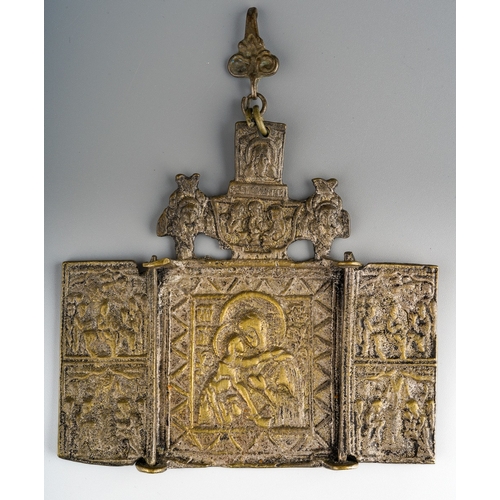 959 - A small Russian bronze orthodox icon triptych, cast in relief, suspended on a hanging clip, height 8... 