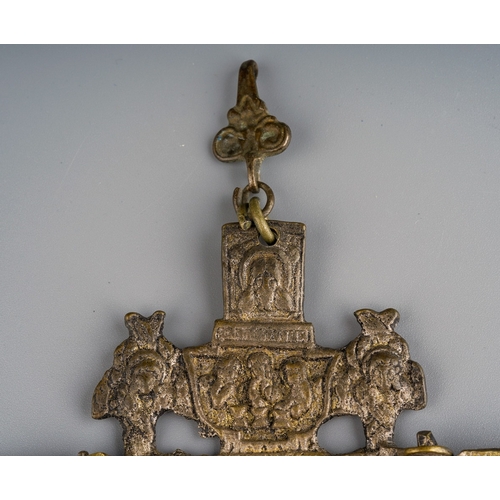 959 - A small Russian bronze orthodox icon triptych, cast in relief, suspended on a hanging clip, height 8... 