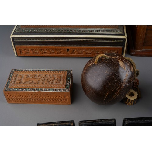 965 - A collection of treen boxes, miniature Victorian style chest of drawers, nut, three 19th century pap... 