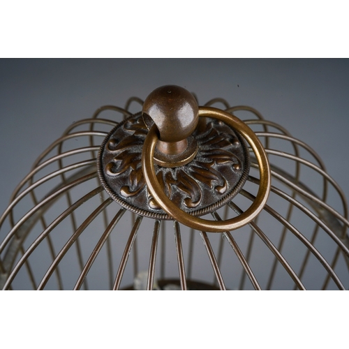 976 - A Bontems style clockwork singing bird automaton, late 19th or early 20th century, probably French, ... 