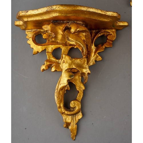 985 - Three early 20th century Italian giltwood and gesso wall brackets, all of foliate design, height of ... 