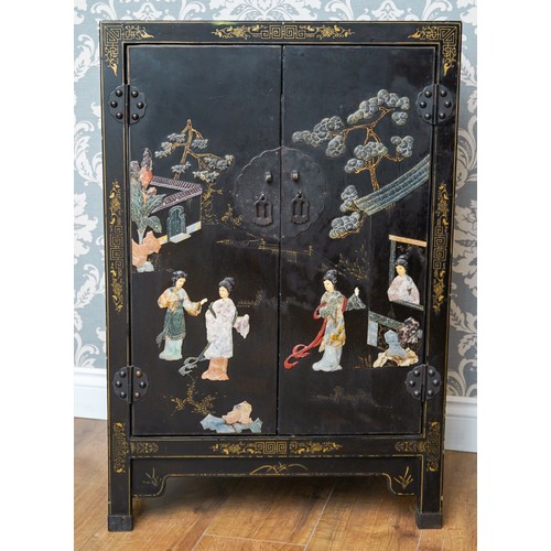 998 - A mid to late 20th century Japanese black lacquered, gilt and Shibayama style double door cabinet, t... 