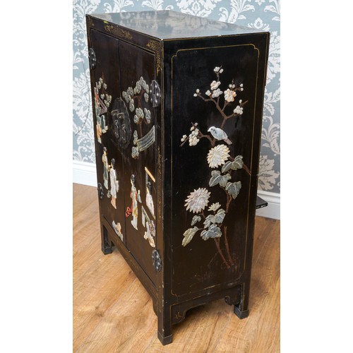 998 - A mid to late 20th century Japanese black lacquered, gilt and Shibayama style double door cabinet, t... 