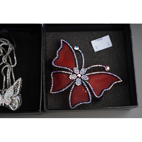 679 - Costume: two Butler & Wilson crystal Butterfly adjustable necklaces, one gold coloured, the other wh... 