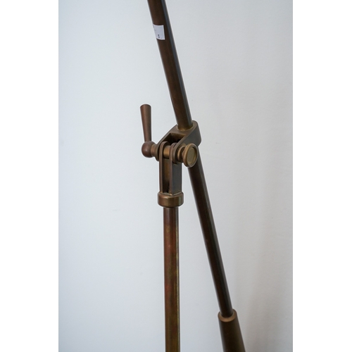 521 - Tall brass floor standing telescopic pendulum lamp, possibly American. Circa 1920/30