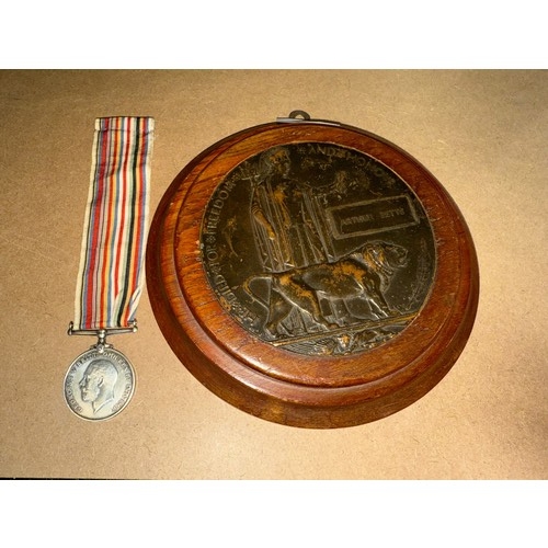 823 - A WWI Memorial death penny for Arthur Betts, mounted, together with WWI George V 1914-1918 medal awa... 