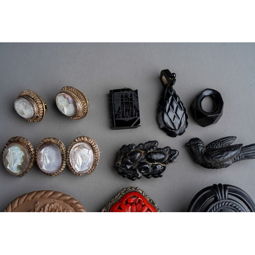 777A - Whitby jet brooches, ring and pendants, lava cameo brooch, Mother of pearl cameo brooch and earrings... 