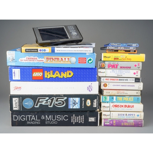 158 - A box of cassette music, computer games, etc, some empty cases and boxes, completer items include PC... 