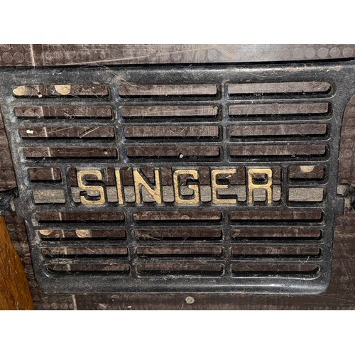 179 - Singer sewing machine on a metal base