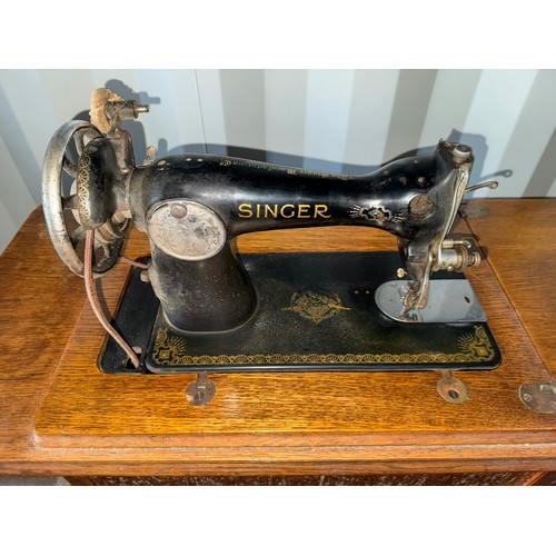 179 - Singer sewing machine on a metal base