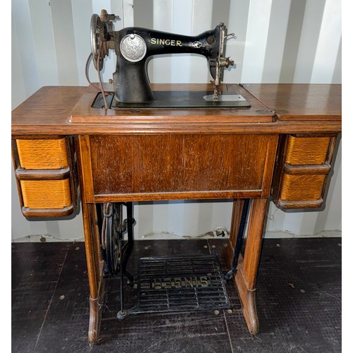 179 - Singer sewing machine on a metal base