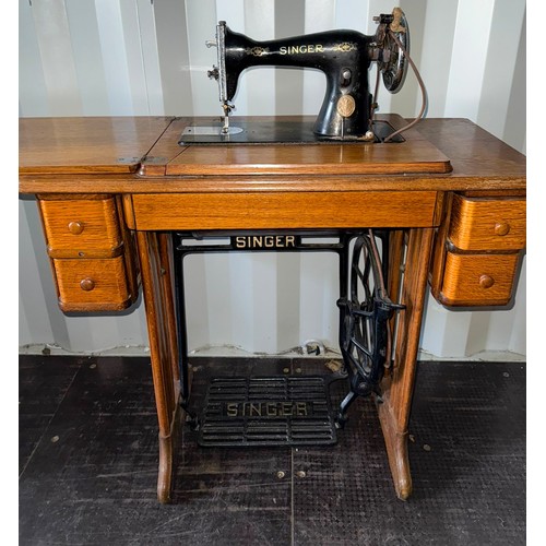 179 - Singer sewing machine on a metal base